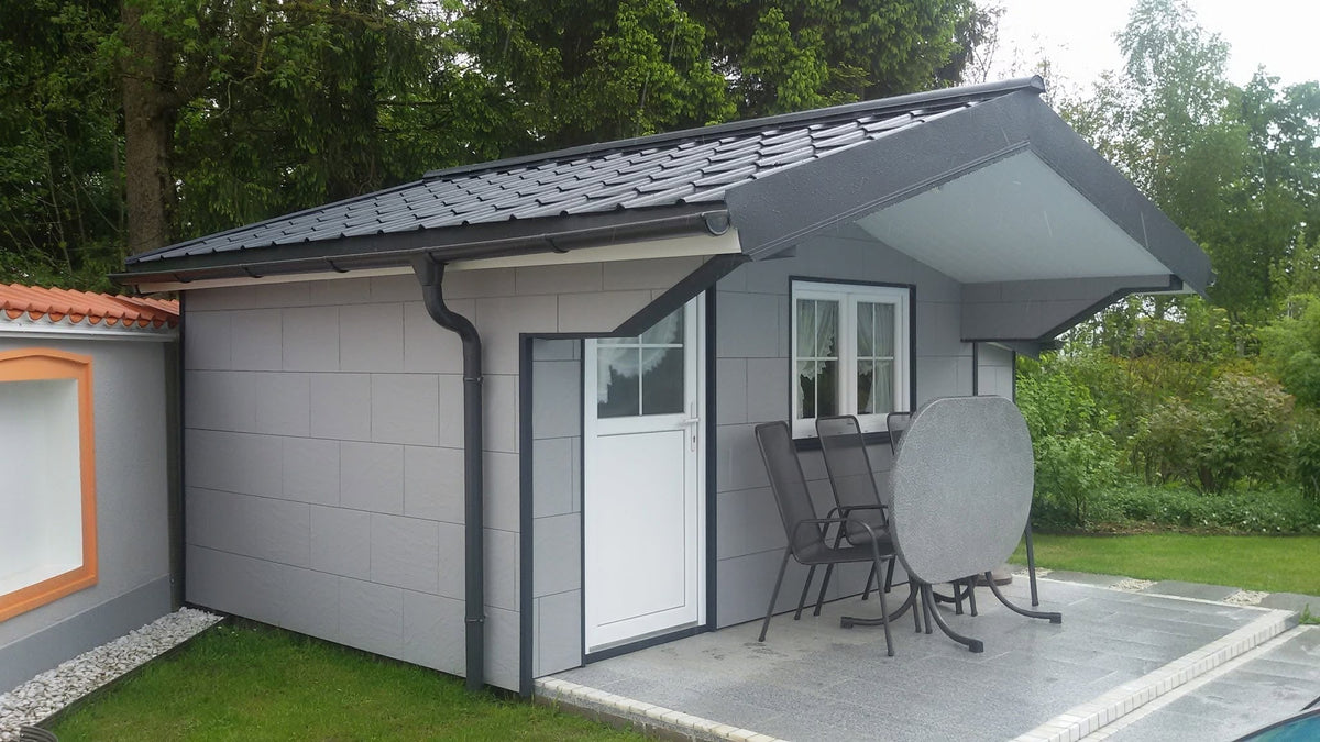 Wartungsfrei & Stilvoll: Poolhaus verkleidet mit Zierer Fassadenplatten in Schieferoptik